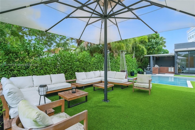 1845 NE 124th St, North Miami, FL 33181 - view of patio / terrace with an outdoor hangout area and an outdoor pool