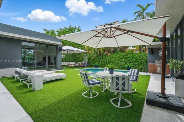 1845 NE 124th St, North Miami, FL 33181 - view of green lawn with area for grilling