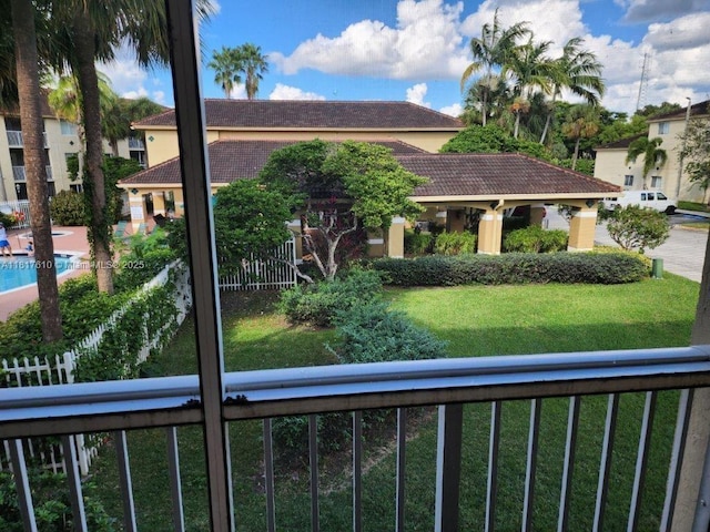 460 S Park Rd Unit 6-209, Hollywood, FL 33021 - view of front of home with a tiled roof, a front lawn, and stucco siding