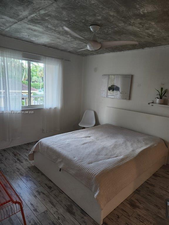 460 S Park Rd Unit 6-209, Hollywood, FL 33021 - bedroom featuring hardwood / wood-style floors