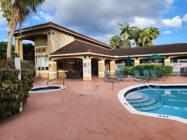 460 S Park Rd Unit 6-209, Hollywood, FL 33021 - community pool featuring a patio and a hot tub
