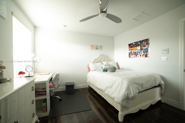 4452 Rainbow Ave, Weston, FL 33332 - bedroom with dark wood-style flooring, baseboards, a ceiling fan, and an office area