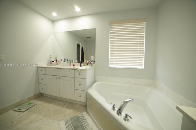 4452 Rainbow Ave, Weston, FL 33332 - bathroom with vanity, a bath, recessed lighting, and plenty of natural light