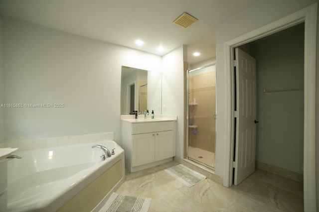 4452 Rainbow Ave, Weston, FL 33332 - full bath featuring vanity, a bath, a stall shower, and recessed lighting