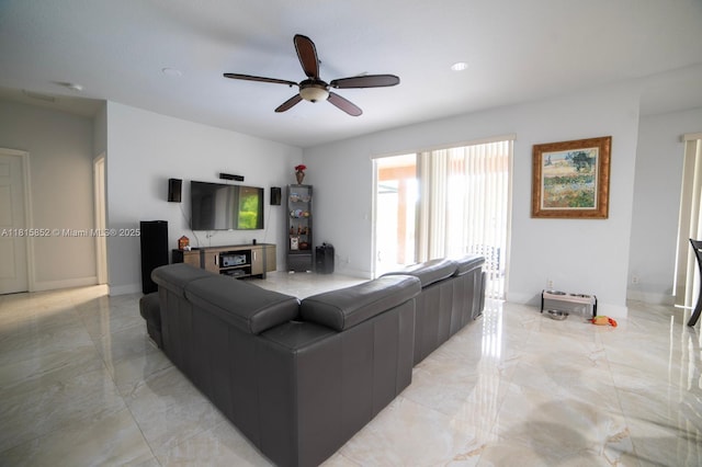 4452 Rainbow Ave, Weston, FL 33332 - living room with light marble finish flooring and a ceiling fan