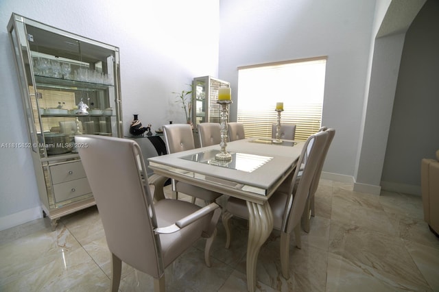 4452 Rainbow Ave, Weston, FL 33332 - dining room with light marble finish flooring