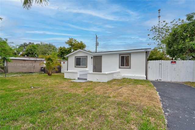 6044 SW 37th St, Miramar, FL 33023 - view of front of house with asphalt driveway
