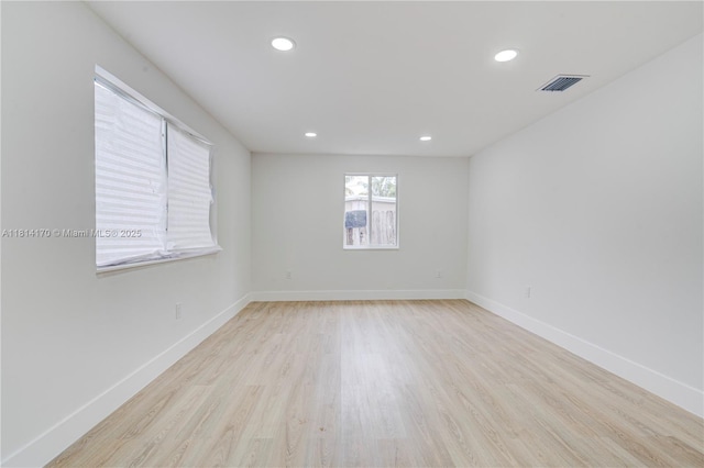 6044 SW 37th St, Miramar, FL 33023 - spare room with wood finished floors, recessed lighting, and baseboards