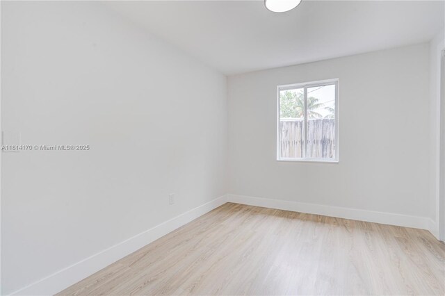 6044 SW 37th St, Miramar, FL 33023 - spare room with light wood-style floors and baseboards