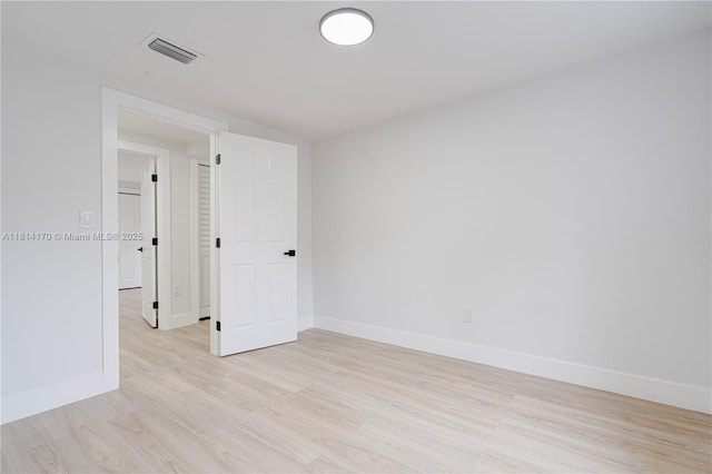 6044 SW 37th St, Miramar, FL 33023 - empty room featuring light wood finished floors and baseboards