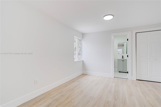 6044 SW 37th St, Miramar, FL 33023 - spare room with wood finished floors and baseboards