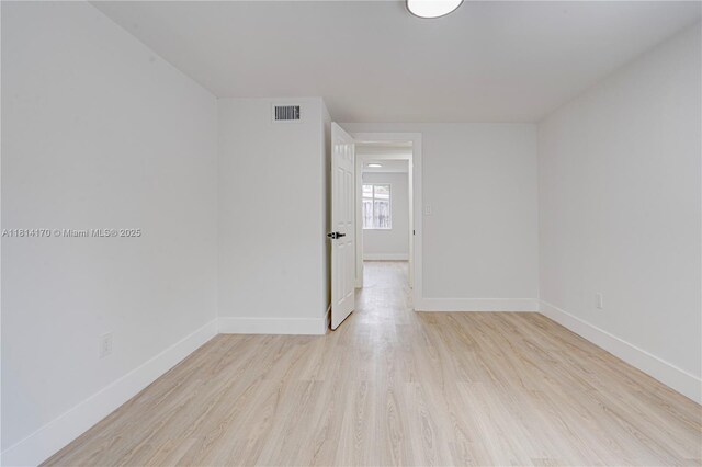 6044 SW 37th St, Miramar, FL 33023 - spare room with light wood-type flooring and baseboards