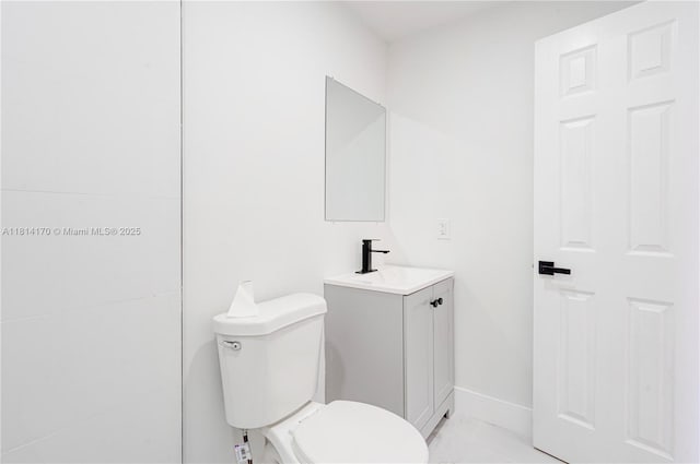 6044 SW 37th St, Miramar, FL 33023 - half bathroom with vanity, toilet, and baseboards