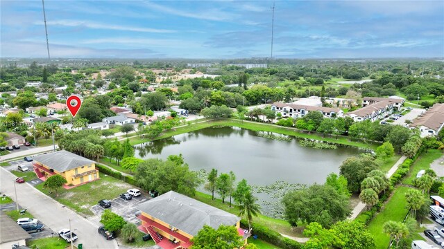 6044 SW 37th St, Miramar, FL 33023 - aerial view of a large body of water and a tree filled landscape