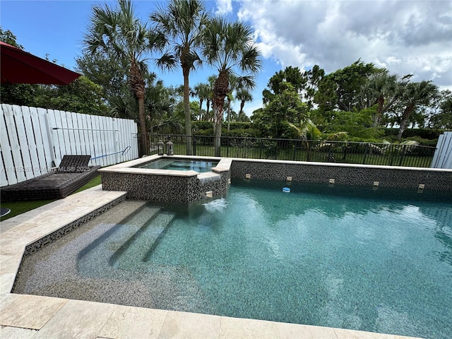 3864 Aspen Leaf Dr, Boynton Beach, FL 33436 - view of swimming pool with a fenced backyard and a pool with connected hot tub