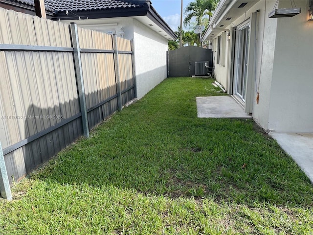 14610 SW 170th Ter, Miami, FL 33177 - view of yard with central AC unit