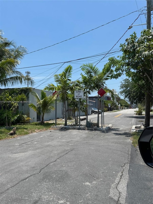 1134 NE 5th Ter, Fort Lauderdale, FL 33304 - view of asphalt street featuring traffic signs