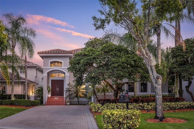 4425 NW 93rd Doral Ct, Doral, FL 33178 - mediterranean / spanish-style house with stucco siding and a tiled roof
