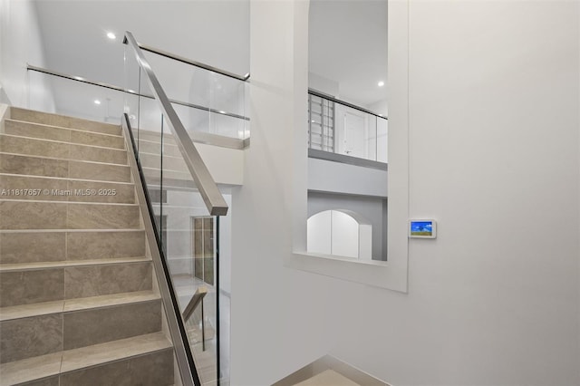 4425 NW 93rd Doral Ct, Doral, FL 33178 - staircase with baseboards
