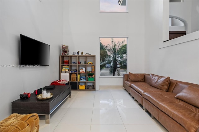4425 NW 93rd Doral Ct, Doral, FL 33178 - tiled living room featuring a high ceiling