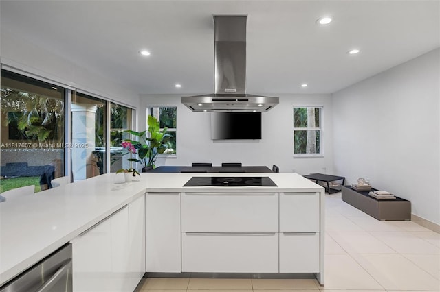 4425 NW 93rd Doral Ct, Doral, FL 33178 - kitchen featuring wall chimney exhaust hood, modern cabinets, black electric stovetop, recessed lighting, and white cabinets