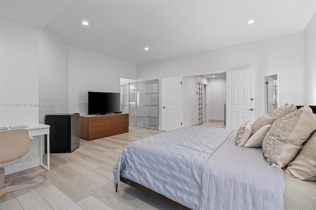 4425 NW 93rd Doral Ct, Doral, FL 33178 - bedroom featuring light wood finished floors and recessed lighting