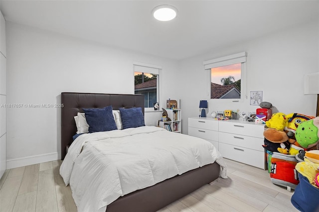 4425 NW 93rd Doral Ct, Doral, FL 33178 - bedroom featuring light wood-type flooring