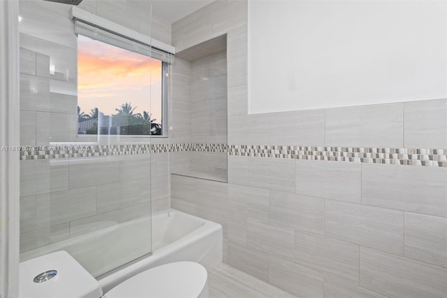 4425 NW 93rd Doral Ct, Doral, FL 33178 - full bathroom featuring toilet and tile walls