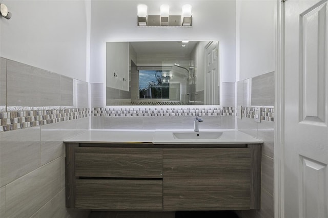 4425 NW 93rd Doral Ct, Doral, FL 33178 - bathroom with vanity, tile walls, a shower, and backsplash
