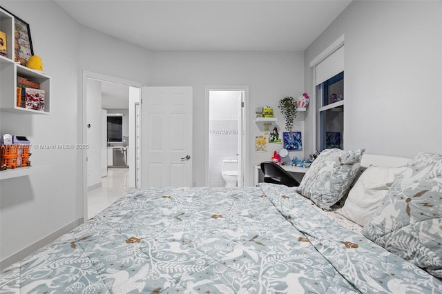 4425 NW 93rd Doral Ct, Doral, FL 33178 - bedroom with ensuite bathroom and baseboards