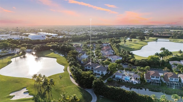 4425 NW 93rd Doral Ct, Doral, FL 33178 - aerial view at dusk of a water view, a residential view, and view of golf course