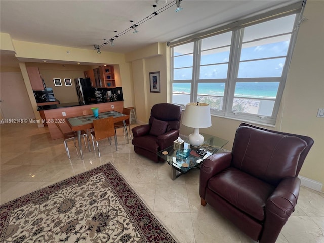 100 Lincoln Rd Unit 848, Miami Beach, FL 33139 - living area featuring track lighting and baseboards
