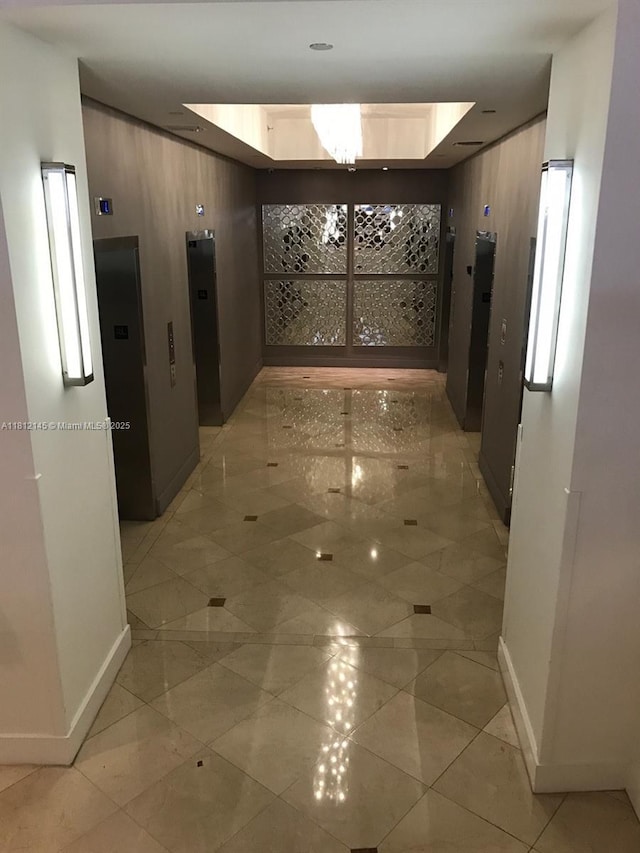 100 Lincoln Rd Unit 848, Miami Beach, FL 33139 - hallway with baseboards and elevator