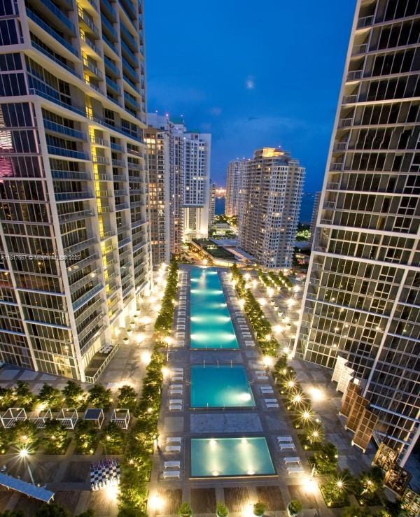 485 Brickell Ave Unit 4711, Miami, FL 33131 - pool at twilight with a view of city lights