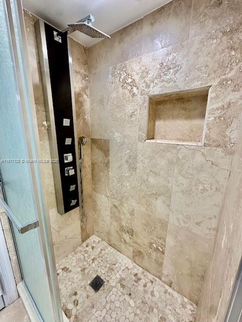 110 Salamanca Ave Unit 207, Coral Gables, FL 33134 - full bath with a tile shower