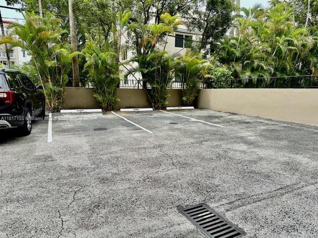 110 Salamanca Ave Unit 207, Coral Gables, FL 33134 - view of uncovered parking lot