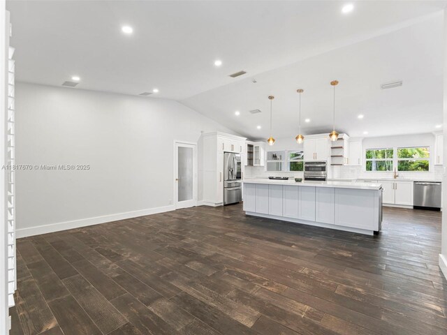 5976 SW 88th Pl, Miami, FL 33173 - kitchen featuring open shelves, stainless steel appliances, light countertops, backsplash, and white cabinetry