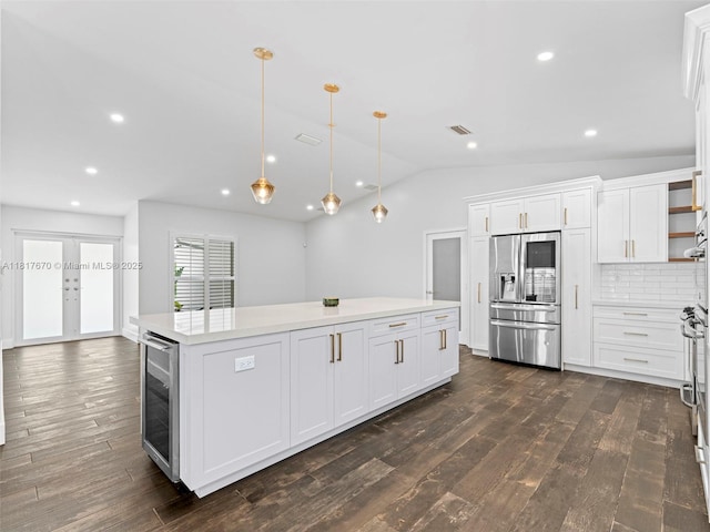 5976 SW 88th Pl, Miami, FL 33173 - kitchen with stainless steel refrigerator with ice dispenser, beverage cooler, a center island, dark wood-style floors, and open shelves