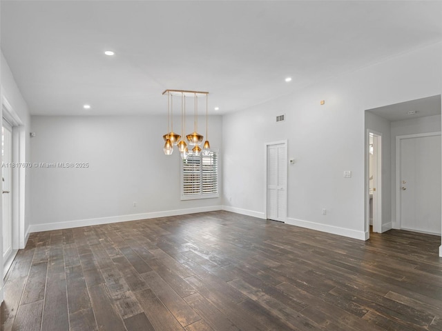 5976 SW 88th Pl, Miami, FL 33173 - empty room featuring a chandelier, dark wood-style flooring, and recessed lighting