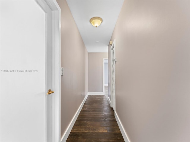 5976 SW 88th Pl, Miami, FL 33173 - hall featuring dark wood finished floors and baseboards