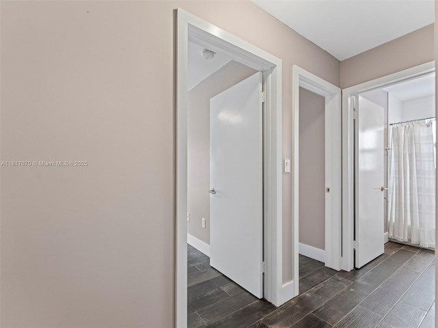 5976 SW 88th Pl, Miami, FL 33173 - corridor with dark wood finished floors and baseboards