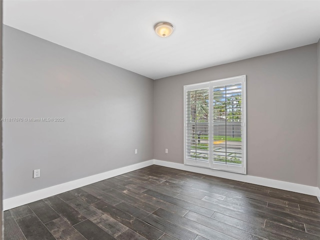 5976 SW 88th Pl, Miami, FL 33173 - spare room featuring dark wood-type flooring