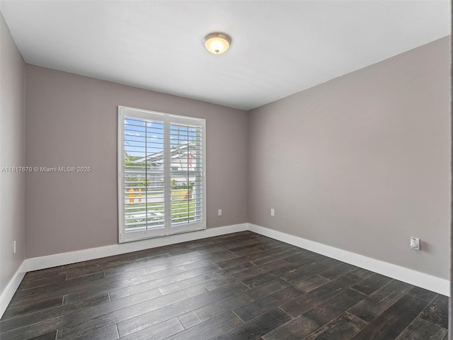 5976 SW 88th Pl, Miami, FL 33173 - spare room with dark wood-type flooring and baseboards