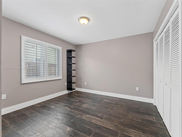 5976 SW 88th Pl, Miami, FL 33173 - unfurnished bedroom featuring hardwood / wood-style floors and a closet
