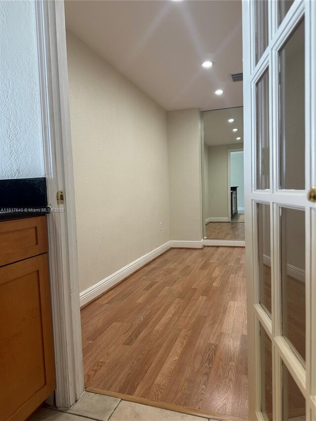 10350 W Bay Harbor Dr Unit 4F, Bay Harbor Islands, FL 33154 - unfurnished room with light wood-style floors and recessed lighting