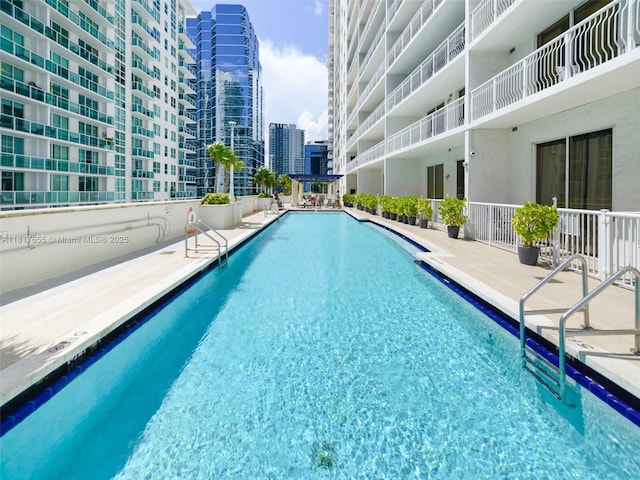 1200 Brickell Bay Dr Unit 2112, Miami, FL 33131 - community pool with a view of city and a patio