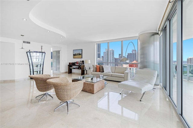 1331 Brickell Bay Dr Unit 4001, Miami, FL 33131 - living room featuring a skyline view, healthy amount of natural light, a wall of windows, and recessed lighting