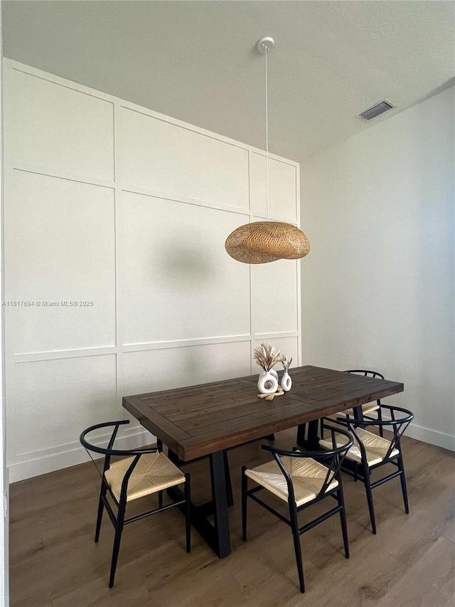 7714 NW 70th Way, Parkland, FL 33067 - dining room with light wood-style floors and baseboards