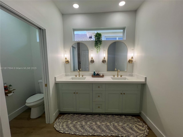 7714 NW 70th Way, Parkland, FL 33067 - full bath featuring double vanity and wood finished floors