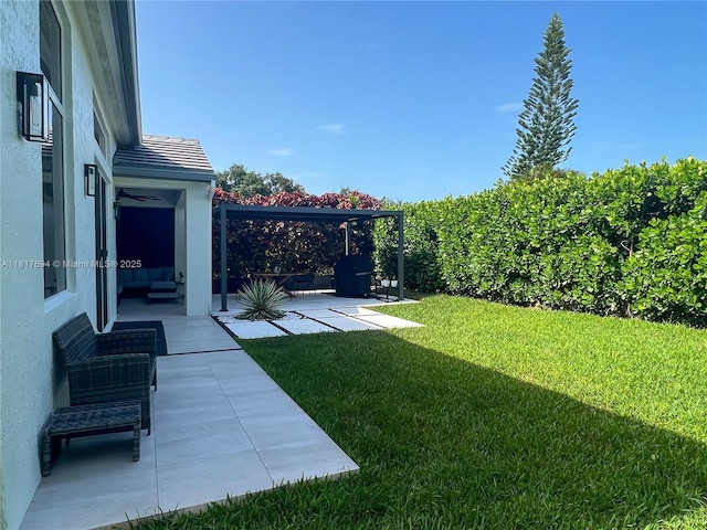 7714 NW 70th Way, Parkland, FL 33067 - view of green lawn featuring a patio area and outdoor lounge area